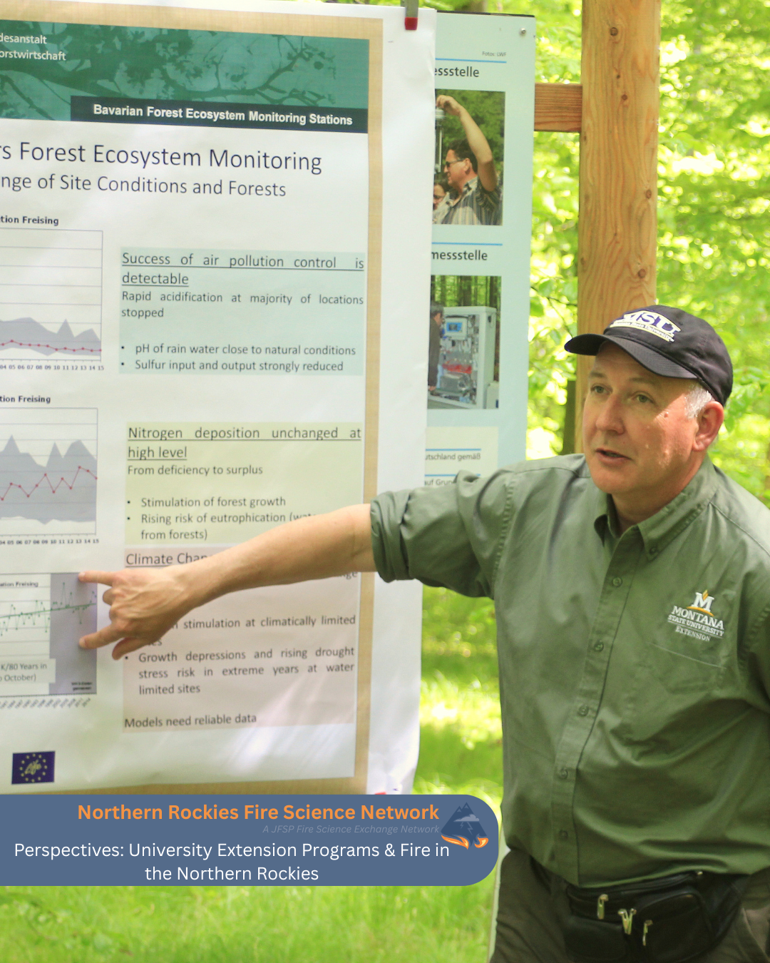 Peter Kolb gives a presentation pointing to a poster